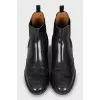 Leather boots decorated with perforation