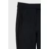 Slim-fit trousers with zippers at the bottom