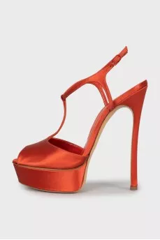 Textile sandals of orange color