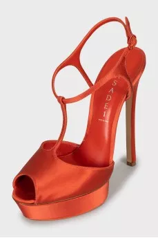 Textile sandals of orange color