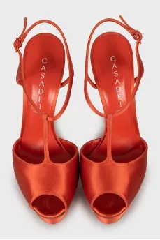 Textile sandals of orange color