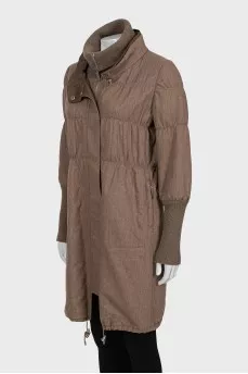 Brown coat with a high neck