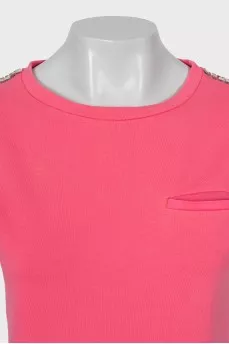 Pink costume decorated with rhinestones