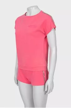 Pink costume decorated with rhinestones