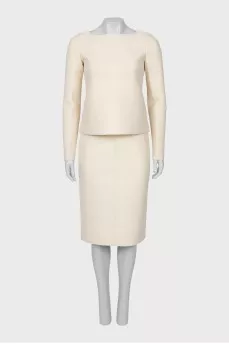 Suit with a soft fabric skirt