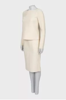 Suit with a soft fabric skirt