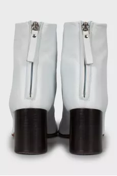 White leather ankle boots