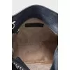 Сумка из кожи с металлическим декором