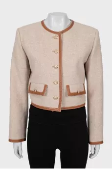 Wool jacket with gold fittings