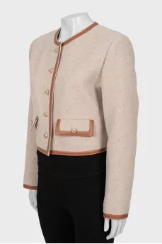 Wool jacket with gold fittings
