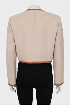 Wool jacket with gold fittings