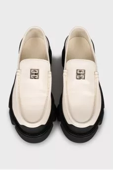 Black and white loafers