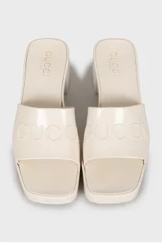 Rubber flip flops with brand logo