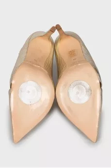 Gold colored leather shoes
