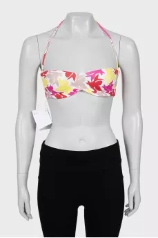 Swimsuit with a bright print and tag