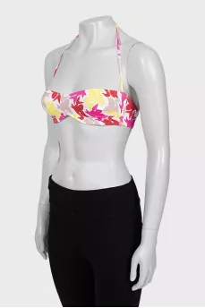 Swimsuit with a bright print and tag