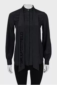 Blouse with branded ties and tag