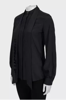 Blouse with branded ties and tag