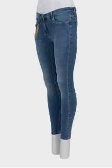 Jeans decorated with chain