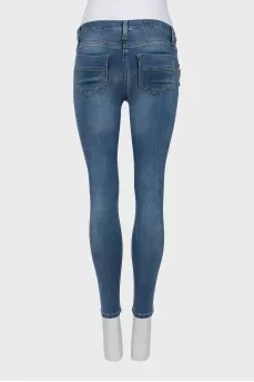 Jeans decorated with chain