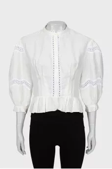 Blouse decorated with lace