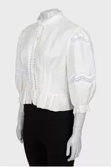 Blouse decorated with lace