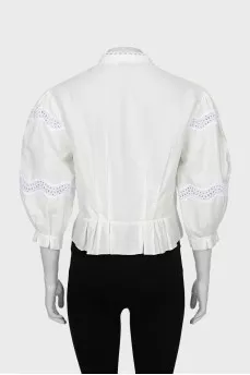 Blouse decorated with lace