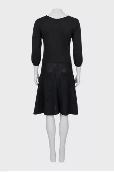 Fitted dress with flared skirt