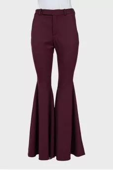 Red flared trousers with tag