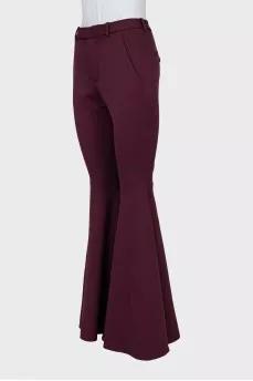 Red flared trousers with tag