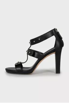 Leather sandals with metal elements