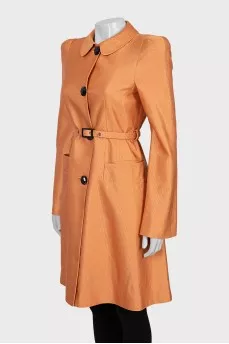 Orange trench coat with belt