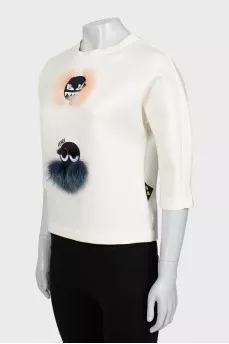 Sweatshirt with fur decor