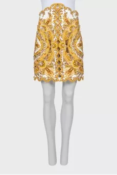 Skirt decorated with golden beads