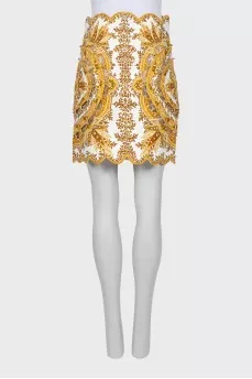 Skirt decorated with golden beads