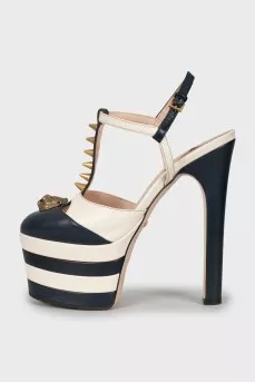 High-heeled shoes with gold decor
