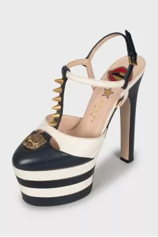 High-heeled shoes with gold decor