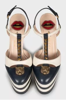 High-heeled shoes with gold decor