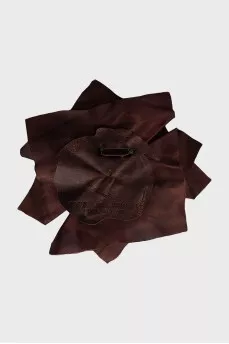 Brooch made of textile and leather