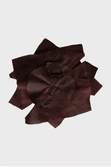 Brooch made of textile and leather