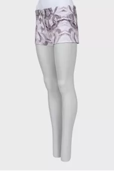 Swim shorts with ties and tag