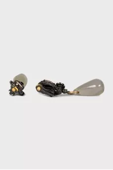 Clip-on earrings decorated with rhinestones