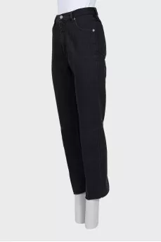 Black jeans with slits at the bottom