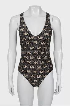 Swimsuit with branded monogram with tag