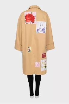 Beige trench coat with ties