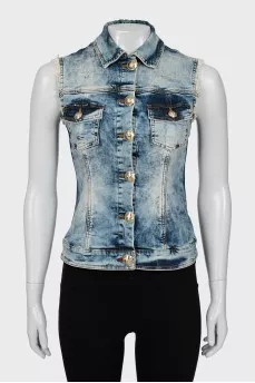 Denim vest with crystals on the back