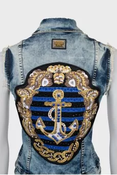 Denim vest with crystals on the back