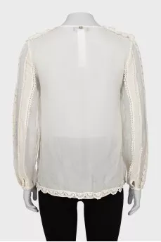 White silk blouse with fringe