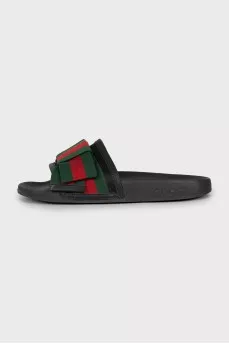 Slippers with textile decor