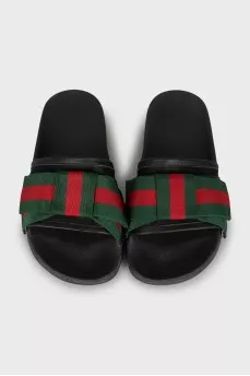 Slippers with textile decor